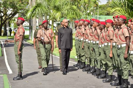 President David Granger reviewing the Guard of Honour yesterday morning at the opening of the Guyana Defence Force's Annual Officers' Conference, held at the Baridi Benab, State House. (Ministry of the Presidency photo)