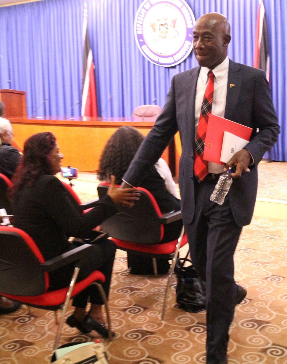 Prime Minister Dr Keith Rowley shakes GML senior reporter Shaliza Hassanali’s hand after his Conversations with the Media at the Diplomatic Centre, St Ann’s yesterday.