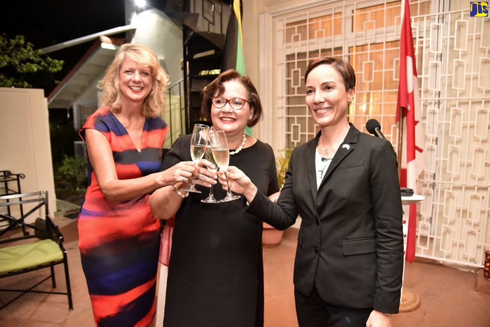 Minister of Foreign Affairs and Foreign Trade, Senator Kamina Johnson Smith (right), along with Canadian High Commissioner to Jamaica Laurie Peters (left), celebrate the appointment of Jamaican born Dr Rosemary Moodie (centre), to the Canadian Senate. Occasion was a reception held in honour of the new Senator, held on January 16, at the official residence of Canadian High Commissioner to Jamaica, in Kingston. 