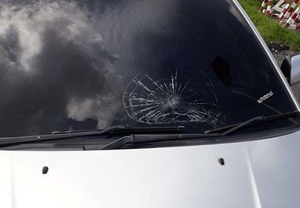 The car windscreen that was struck by a bullet during the chase.