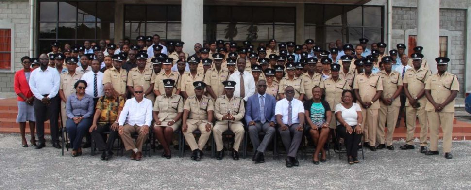 This police photo shows Police Service Commission Chairman Paul Slowe (seated fourth from right) with Police Commissioner Leslie James (seated fifth from right), the newly promoted personnel and other police officials.
