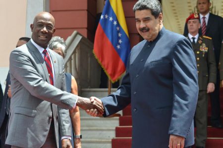 Prime Minister Dr Keith Rowley (left) shakes hands with President of Venezuela Nicolas Maduro before the signing ceremony for the Dragon gas field deal at Presidential Palace, Miraflores Caracas, in August 2018.
