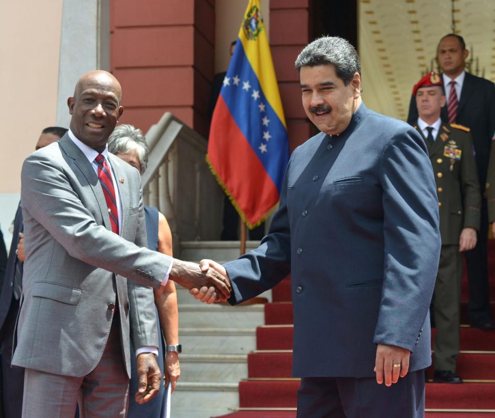Prime Minister Dr Keith Rowley (left) shakes hands with President of Venezuela Nicolas Maduro before the signing ceremony for the Dragon gas field deal at Presidential Palace, Miraflores Caracas, in August 2018.
