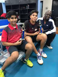 Jonathan Van Lange, centre, credits former Caribbean men’s singles champion Sydney Christophe, right, for his success on his recent tour of the US.