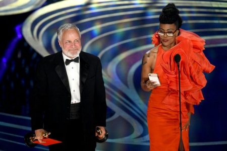(L-R) Jay Hart and Hannah Beachler accept the Production Design award for Black Panther onstage during the 91st Annual Academy Awards at Dolby Theatre on February 24, 2019 in Hollywood, California. (Photo by Kevin Winter/Getty Images)
