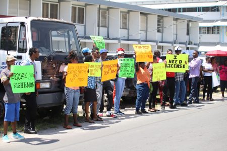Members and supporters of the Deaf Association of Guyana who staged a peaceful protest yesterday outside of the Ministry of Public Security’s Brickdam office. (Terrence Thompson photo) 