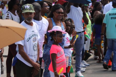 The scorching sun did not prevent spectators from viewing the 49th Republic Anniversary float parade on Saturday on Vlissingen Road.