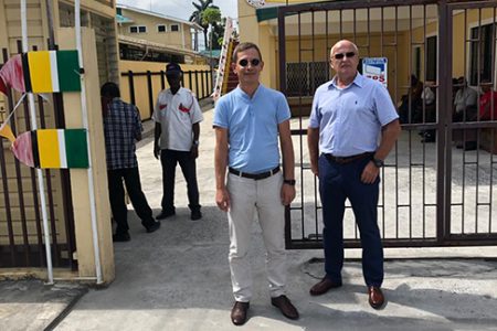 BCGI Personnel Officer Mikhail Krupenin and RUSAL representative Vladimir Permyakov yesterday in front of the Department of Labour. 