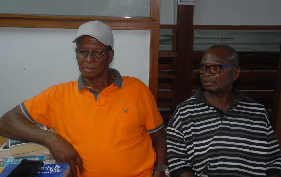 Guyana Bauxite and General Workers Union officials Ivan Leacock and Garfield Brutus.