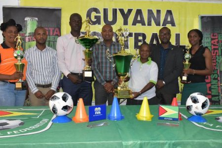 Representatives from the top four finishers in the Stag Beer Super 16 Yearend Championship, posing with their spoils at the presentation ceremony held at the GFF Headquarters.
