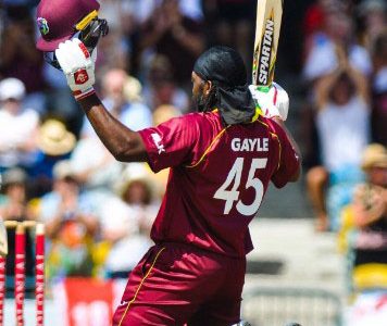 West Indies opener Chris Gayle celebrates his century in the opening ODI against England at Kensington Oval.
