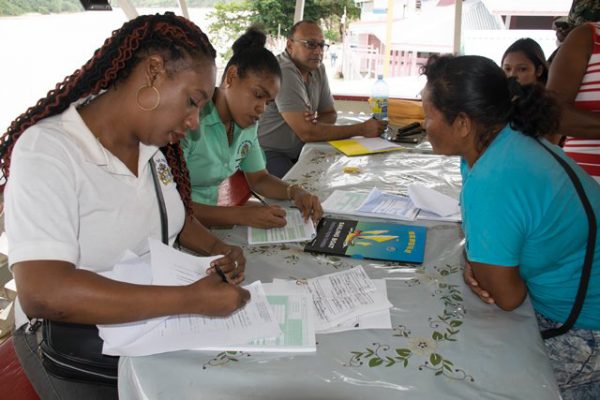 Staff of the General Register Office conducting interviews (DPI photo)