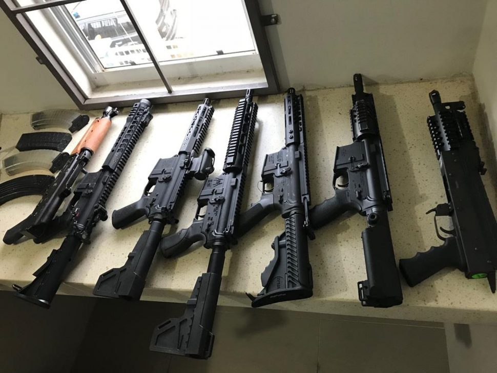 Some of the high-powered guns seized during the raid in Cunupia in November 2018.