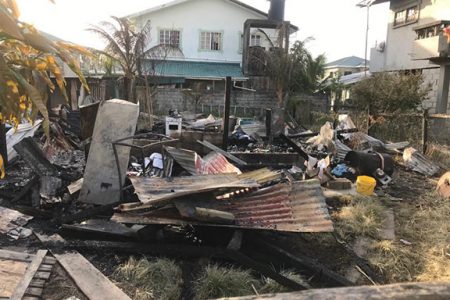The remains of Yowani Sasnarine’s home after the fire.