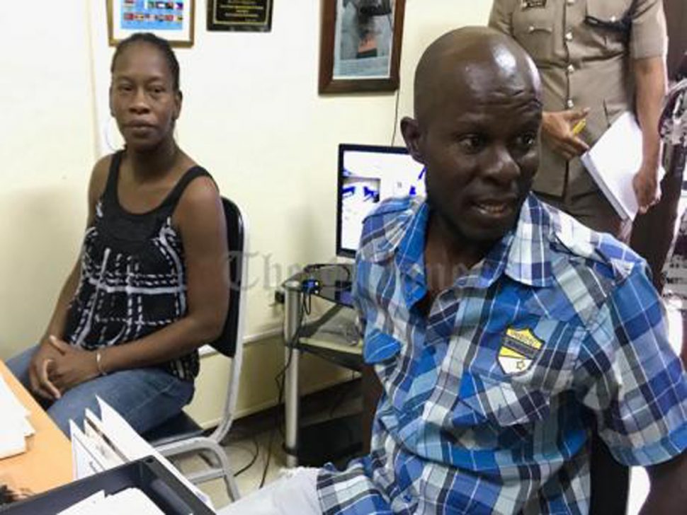 Suzett ​Whyte. and Sinclair Hutton at the Denham Town police station after receiving word that their stolen baby had been found – Ricardo Makyn photo