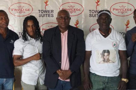 Boxing standouts, Keevin Allicock (second from left) and Desmond Amsterdam (extreme right) are set to highlight the card against opponents from Trinidad and Tobago. The two boxers along with President of the GBA, Steve Ninvalle, Alford McDonald and AIBA official, James Beckles posed for a photo yesterday following a press briefing at Tower Suites.
