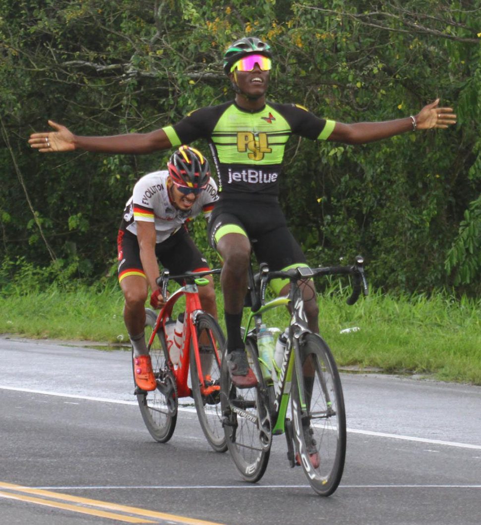 Paul DeNobrega pictured second in this Orlando Charles photo sprinted away with the spoils of the R&R International 40-mile road race yesterday.
Wnner of Saturday’s feature event, Romello Crawford who celebrated, was disregarded by the race officials after he failed to register and joined the race at Vreed-en-Hoop after it commenced. 
