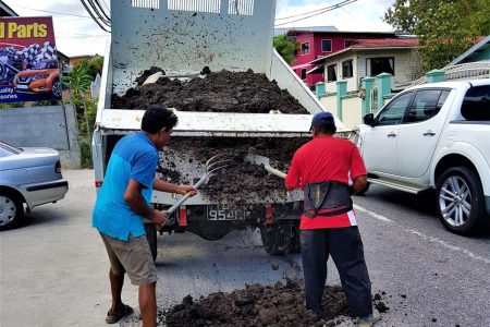 Fyzabad residents took up the onus of repairing the road themselves