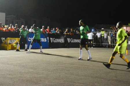  GOAL! Phoenix Ballers [dark green] concedes their first goal against West Side Ballers at the Pouderoyen Tarmac in the  Guinness ‘Greatest of the Streets’ West Demerara, East Bank Demerara Championships.
