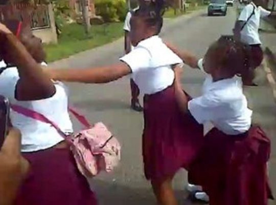 A camera phone recorded of a fight involving school children in east Trinidad.