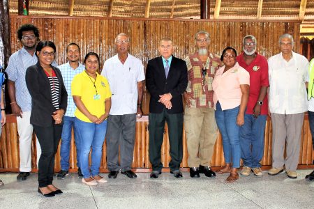Social Cohesion Minister, Dr. George Norton (sixth from right) meeting with some of the stakeholders. Winslow Craig is (fifth from right).