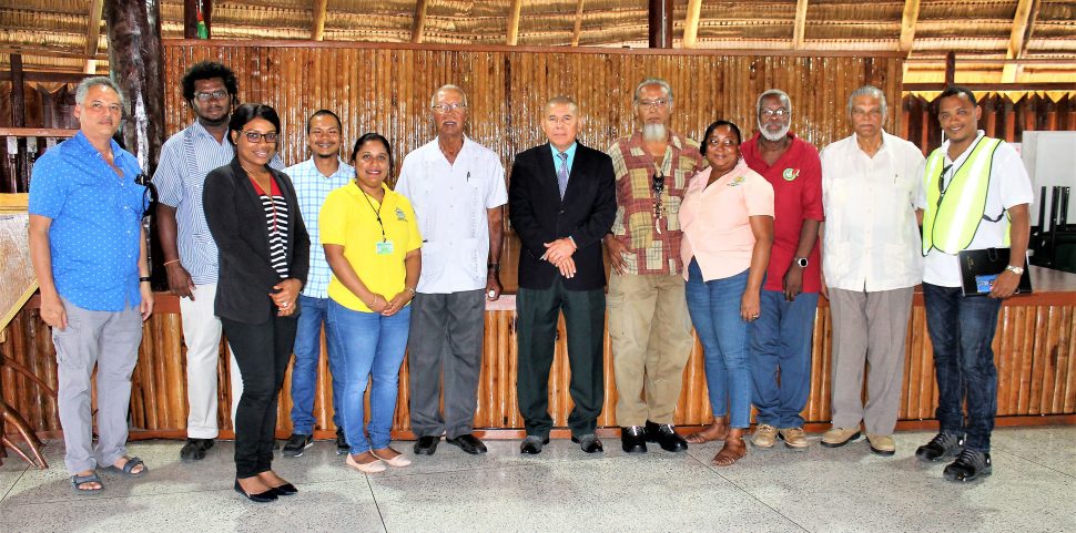 Social Cohesion Minister, Dr. George Norton (sixth from right) meeting with some of the stakeholders. Winslow Craig is (fifth from right).