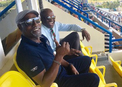 Sir Vivian Richards gives a thumbs up as he watches the second Test against England last weekend, alongside local cricket administrator Zorol Barthley.