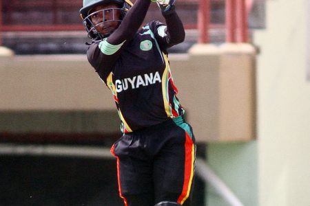 Shemaine Campbelle smashes a six in Guyana’s losing cause. (Orlando Charles photo)
