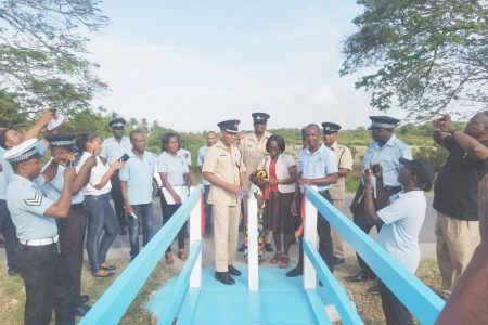 Turkeyen bridge: The Turkeyen Police Station Management Committee on Friday handed over a newly constructed footpath bridge to the Turkeyen Police Station. The bridge was commissioned by Police Commander Calvin Brutus in the presence of ranks from the station and members of the management committee.