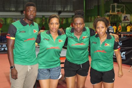 Guyana women’s team after their silver medal finish last evening. Missing is top player Chelsea Edghill. From left,   Idi Lewis, coach, Jody-Ann Blake, Trenace Lowe and Natalie Cummings. (Royston Alkins photo) 
