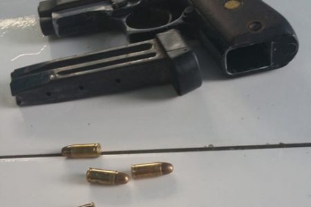 The unlicensed pistol along with the eight live rounds that were allegedly found in Rohit Wahid’s possession.