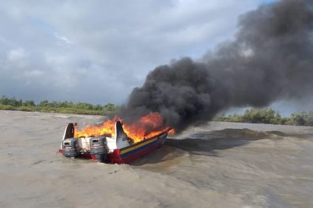 The passenger boat on fire