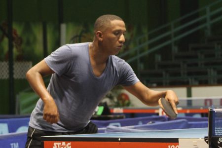  Brandon Bell on his return to competitive table tennis action, served his way to the Forbes Burnham`B’ class title (Royston Alkins photo) 
