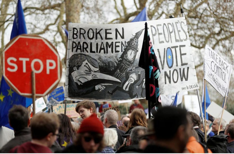 EU supporters, calling on the government to give Britons a vote on the final Brexit deal, participate in the ‘People’s Vote’ march in central London yesterday. REUTERS/Henry Nicholls