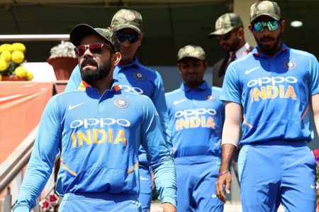 The Indian players with the camouflage caps.
