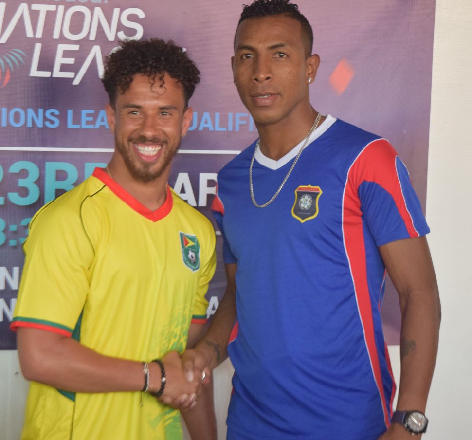 Set for battle:  Golden Jaguars Captain Sam Cox (left) and Belizean Jaguars Woodrow West pose for the cameras ahead of their pivotal clash in the CONCACAF Nations League
