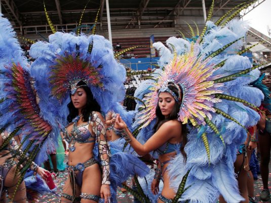 Masqueraders from Harts Carnival presentation of Legendary on the Socadrome stage.