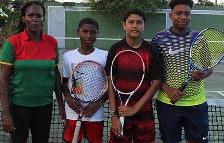 Coach Shelly Daly and the Guyanese trio who participated in the World Junior Lawn Tennis Under – 14 Tournament.