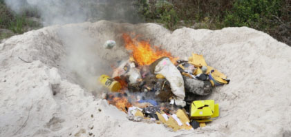 Some of the drugs being destroyed by burning yesterday morning at Yarrowkabra, Soesdyke-Linden Highway.