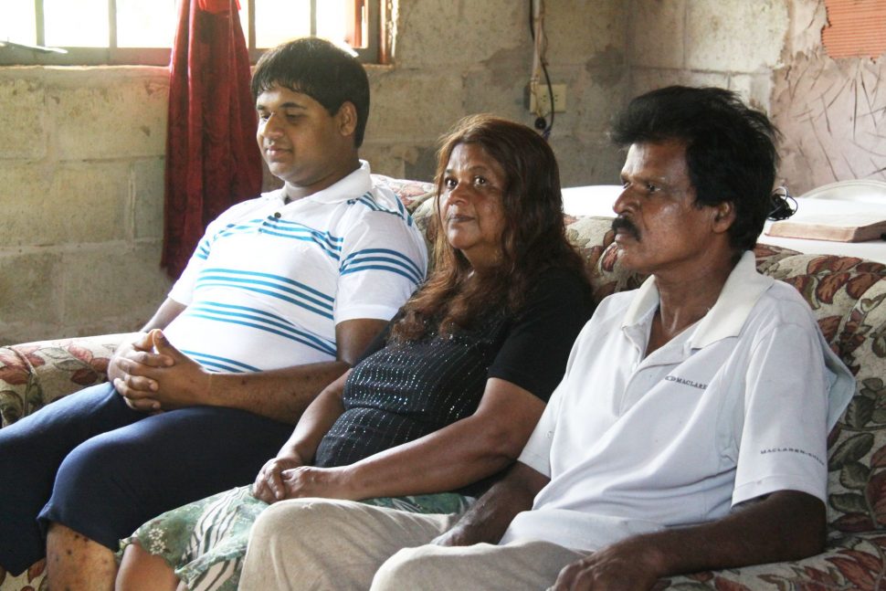 Krishna Mathura, right, his wife Balmatee and son Govinda at their  Gasparillo home.