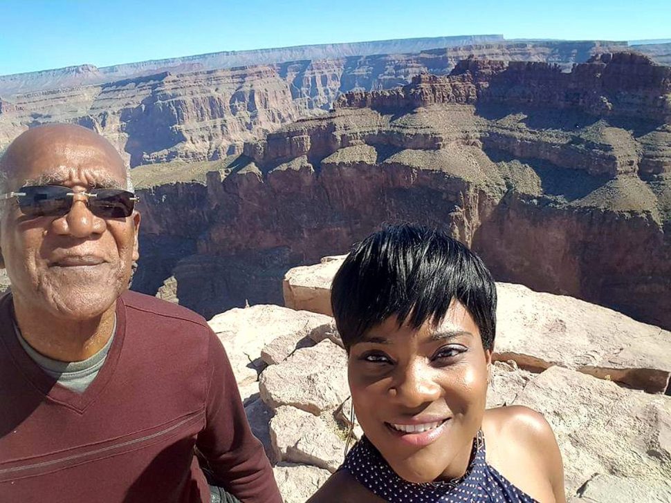 A photo of Essie Parks-Ewing and her father Donald Parks is happier times. Parks was killed during a home invasion earlier this week