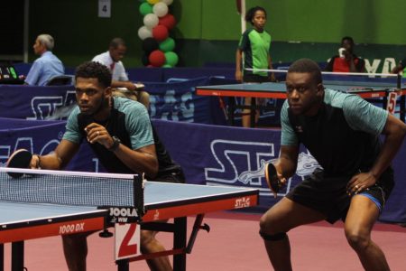 Guyana Men’s doubles pair Christopher Franklin (right) and Joel Alleyne during their contest against the Dominica Republic (Royston Alkins photo)