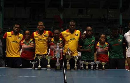 Director of sports Christopher Jones along with Guyana’s contingent at the conclusion of the championships last evening (Royston Alkins photo) 