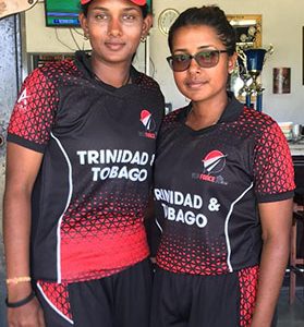Player of the match Leandra Ramdeen and Karishma Ramharack embrace each other after wrecking Leeward yesterday at Bourda