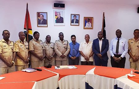 Commissioner of Police Leslie James and Mayor Ubraj Narine (centre) along with officers from the top brass of the force, following the meeting.