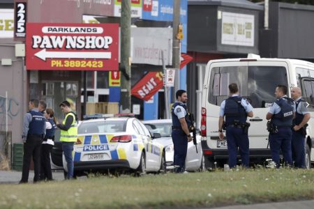 Police stand outside a mosque in Christchurch, New Zealand. Multiple people were killed during shootings at two mosques full of people attending Friday prayers.