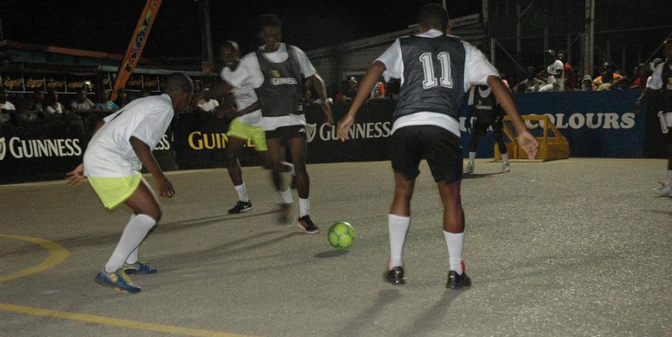 Flashback- Scenes from the group stage action in the Guinness ‘Greatest of the Streets’ Berbice Championship at the NA Ferry Tarmac between defending championship Trafalgar [white] and NA Kings-B
