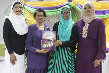 From left, UNDP assistant resident representative Sharifa Ali-Abdullah, Madinah House patron Zalayhar Hassanali, Madinah House president Lydia Choate and Sabeerah Khan display the new magazine at yesterday’s launch.