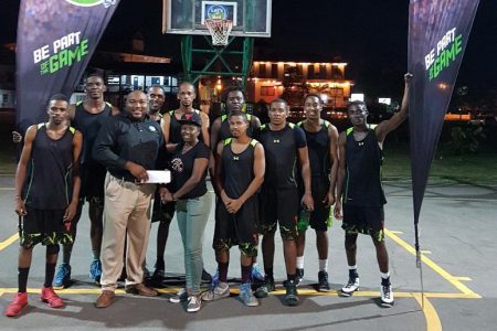 Vikings Basketball Club receives their third  place prize after defeating Pacesetters at the Burnham Court in the [GABA]/’Lets Bet Sports’ basketball championships.
