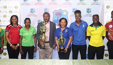 Who will win? Cricket West Indies Director, Anand Sanasie and CWI Project Officer for Women’s Cricket, Josina Luke surrounded by the six territorial captains from left to right, Afy Fletcher (Windward Islands), Merissa Aguilliera (Trinidad and Tobago), Shemaine Campbelle (Guyana), Hayley Matthews (Barbados), Stafanie Taylor (Jamaica) and Shawnisha Hector (Leeward Islands) who are vying for the CWI Colonial Medical Insurance Super50 and T20 Blaze titles in Guyana
